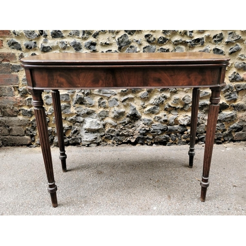 198 - A George III Gillows style fold over table, the D end top opening to reveal a plain mahogany surface... 