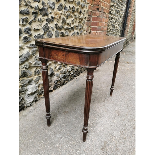 198 - A George III Gillows style fold over table, the D end top opening to reveal a plain mahogany surface... 