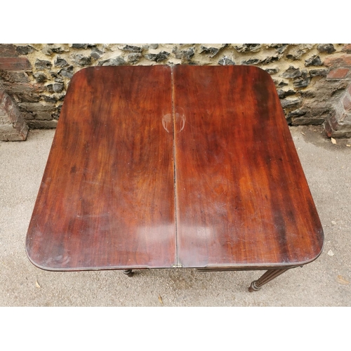 198 - A George III Gillows style fold over table, the D end top opening to reveal a plain mahogany surface... 