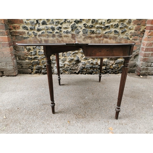 198 - A George III Gillows style fold over table, the D end top opening to reveal a plain mahogany surface... 