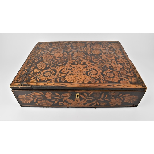 167 - An 18th century Dutch marquetry box, of rectangular shape, the lied and sides extensively decorated ... 