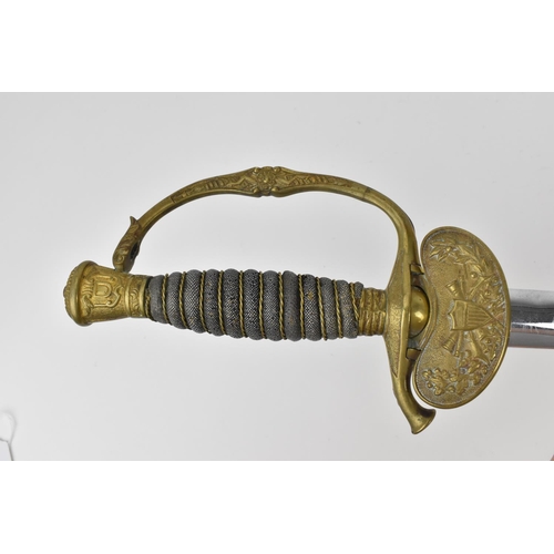 184 - A late 19th century American army officer's dress sword, with etched blade designed with the America... 