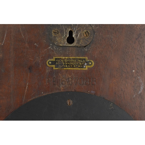 56 - A mahogany cased Art Deco Zenith 18 day circular convex, wall hanging wall clock. having a centre wi... 