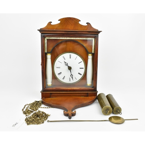 63 - A 19th century German seven day postman's alarm chain driven striking pendulum wall clock.  The case... 