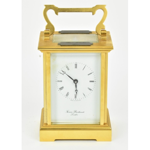 68 - A late 20th century brass cased carriage clock having a white enamel dial with Roman numerals, Bregu... 