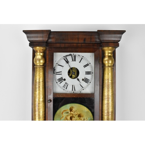 71 - A late 19th century Seth Thomas rosewood cased wall hanging clock. The dial flanked by two gilt pain... 