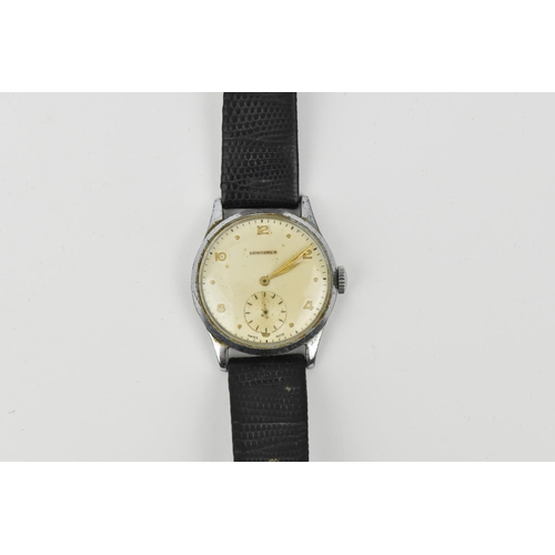 205 - A chrome gent's circa 1950, Longines Wristwatch. Having gilt hands with subsidiary seconds dial and ... 