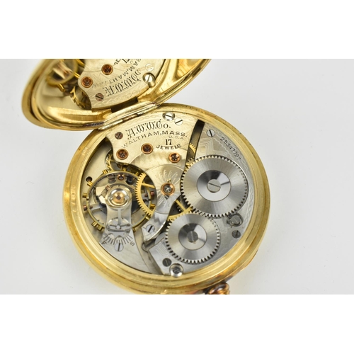 211 - A 18ct gold open faced Walthams U.S.A. Pocket watch with white enamel dial having Arabic numerals an... 