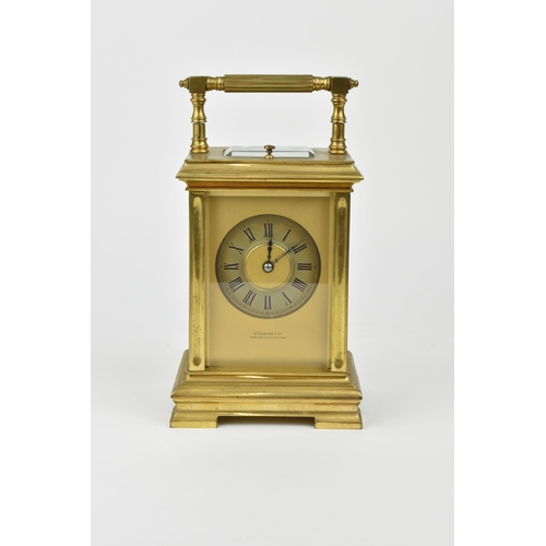 215 - A J. Ullmann & Co. Brass cased repeating and striking carriage clock having a silvered ring dial wit... 