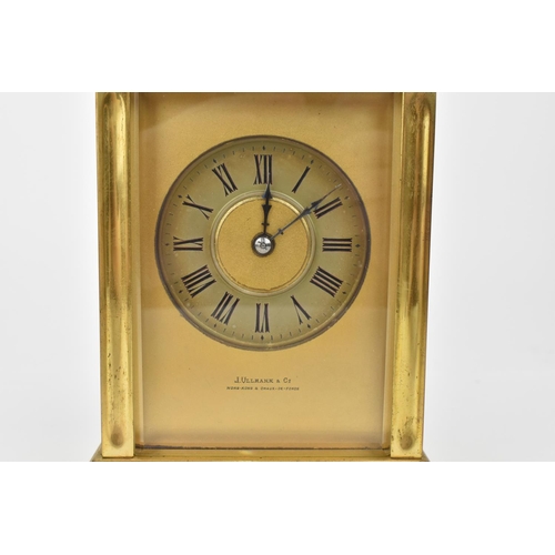 215 - A J. Ullmann & Co. Brass cased repeating and striking carriage clock having a silvered ring dial wit... 