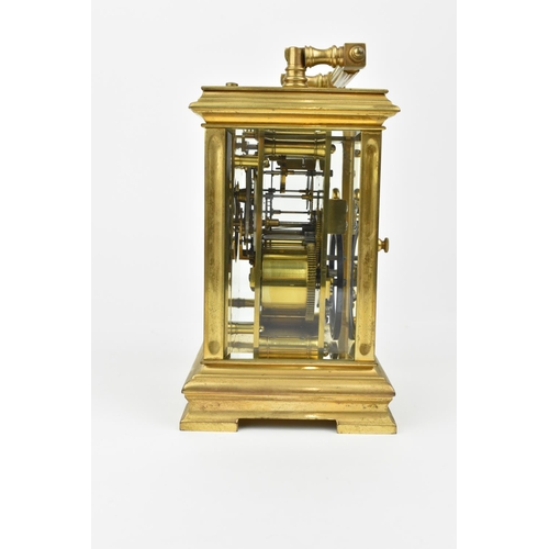 215 - A J. Ullmann & Co. Brass cased repeating and striking carriage clock having a silvered ring dial wit... 