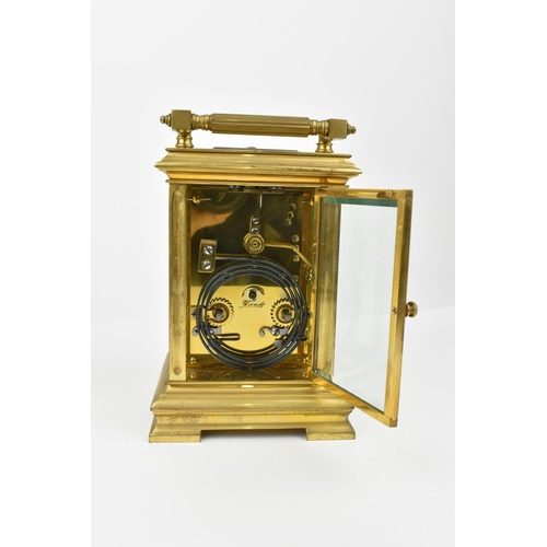 215 - A J. Ullmann & Co. Brass cased repeating and striking carriage clock having a silvered ring dial wit... 