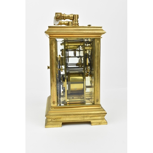 215 - A J. Ullmann & Co. Brass cased repeating and striking carriage clock having a silvered ring dial wit... 