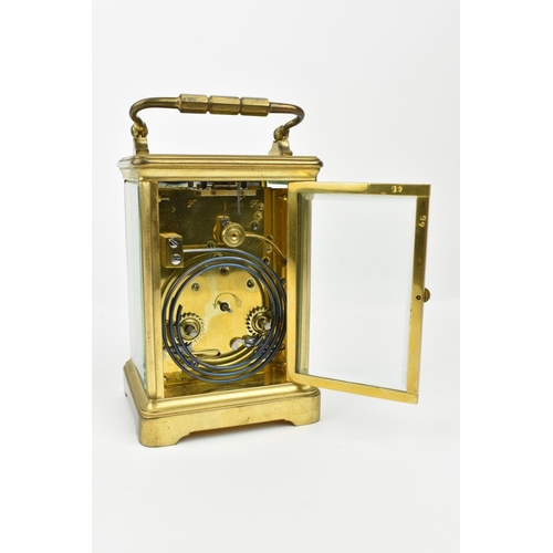 217 - A French brass cased striking carriage clock. With white enamel dial having Roman numerals. Approx 1... 