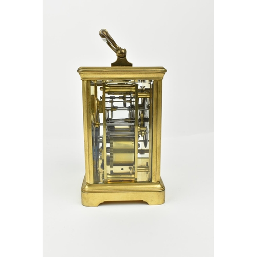 217 - A French brass cased striking carriage clock. With white enamel dial having Roman numerals. Approx 1... 