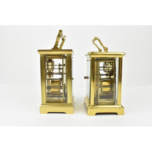 221 - A pair of brass cased carriage clocks with enamel dials and having Roman numerals. One stamped 1858,... 