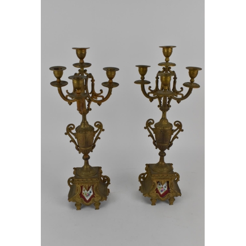 222 - A early 20th century three piece spelter and porcelain mantel clock set. Comprising, a central mante... 