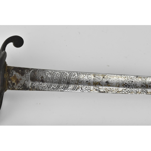 180 - A Victorian Officer's sword, with original metal scabbard, pierced basket and shagreen grip, the bla... 