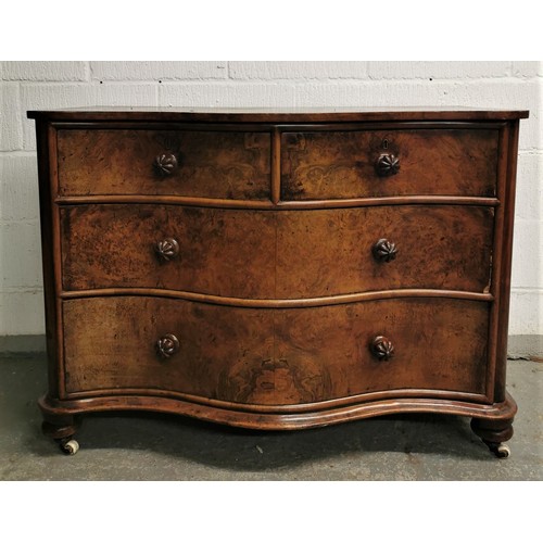 171 - A Victorian serpentine front walnut chest of drawers, with two short drawers above two long, each bu... 