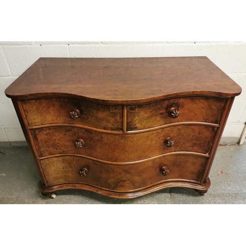 171 - A Victorian serpentine front walnut chest of drawers, with two short drawers above two long, each bu... 