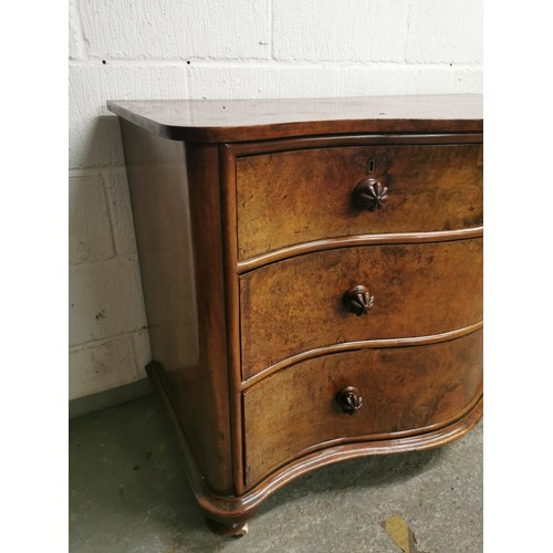 171 - A Victorian serpentine front walnut chest of drawers, with two short drawers above two long, each bu... 