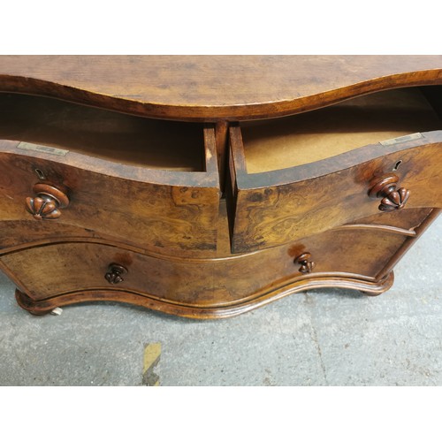 171 - A Victorian serpentine front walnut chest of drawers, with two short drawers above two long, each bu... 