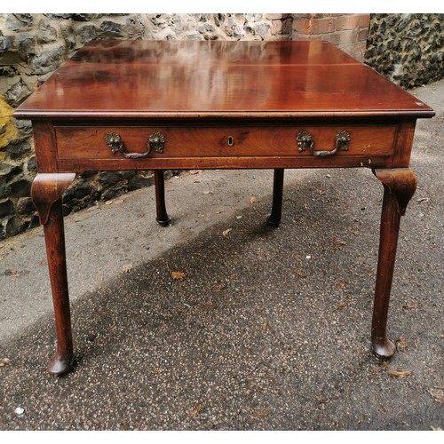 173 - A George III mahogany fold over tea table, with twin handled single frieze drawer, supported on four... 