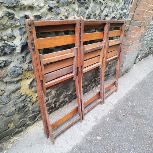 225 - Cowra Military Camp - A Second World War mahogany 3 seat folding campaign bench. Stamped to the back... 