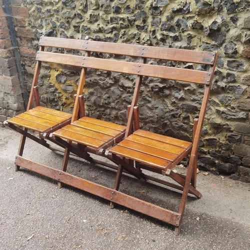 225 - Cowra Military Camp - A Second World War mahogany 3 seat folding campaign bench. Stamped to the back... 