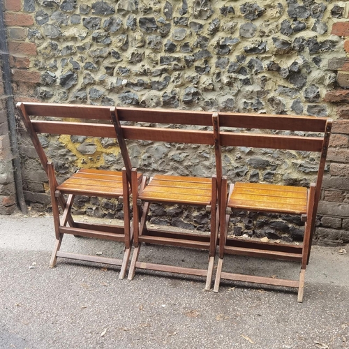 225 - Cowra Military Camp - A Second World War mahogany 3 seat folding campaign bench. Stamped to the back... 