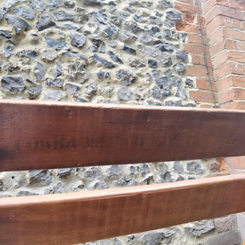 225 - Cowra Military Camp - A Second World War mahogany 3 seat folding campaign bench. Stamped to the back... 