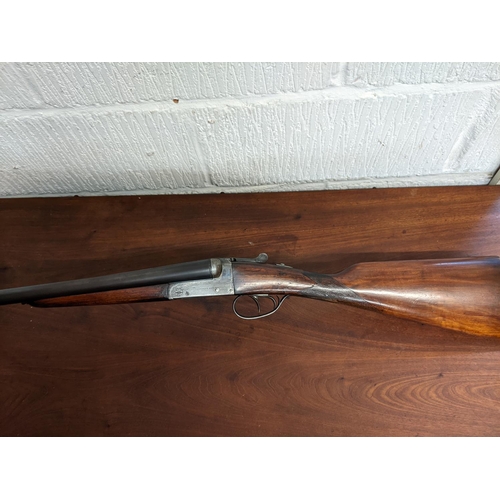 218 - An Aguirre & Aranzabal side by side 12 bore shotgun, 26