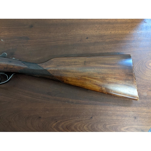 218 - An Aguirre & Aranzabal side by side 12 bore shotgun, 26