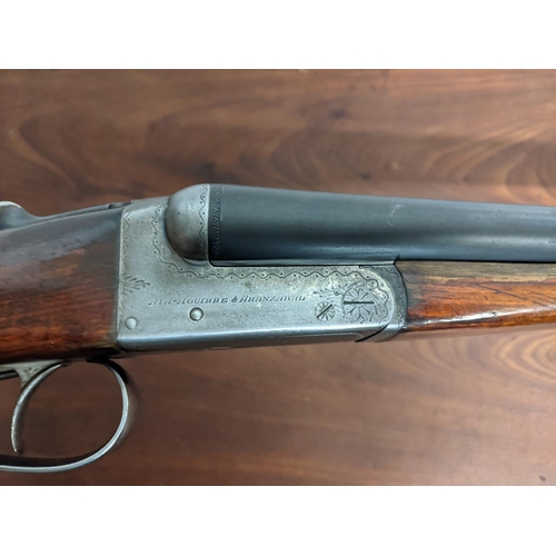 218 - An Aguirre & Aranzabal side by side 12 bore shotgun, 26