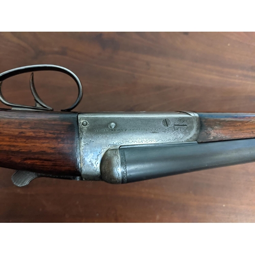 218 - An Aguirre & Aranzabal side by side 12 bore shotgun, 26