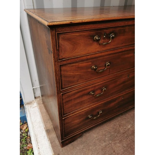 197 - A George III straight fronted mahogany chest of drawers, with two short drawers over three graduated... 