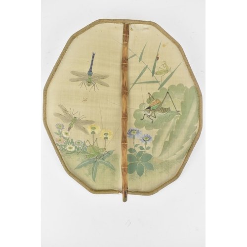 104A - A pair of Japanese 20th century watercolours on silk, one of a woman sat on a rock in a landscape, a... 