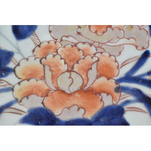 105 - A late 18th century Japanese Imari bleeding / shaving bowl, with a central floral composition in a v... 