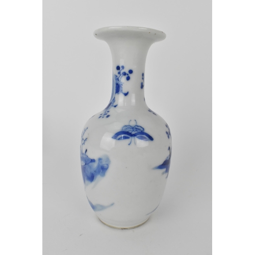 107 - A late Qing dynasty blue and white bottle vase of ovoid shape with a broad flat rim, a continuous ri... 