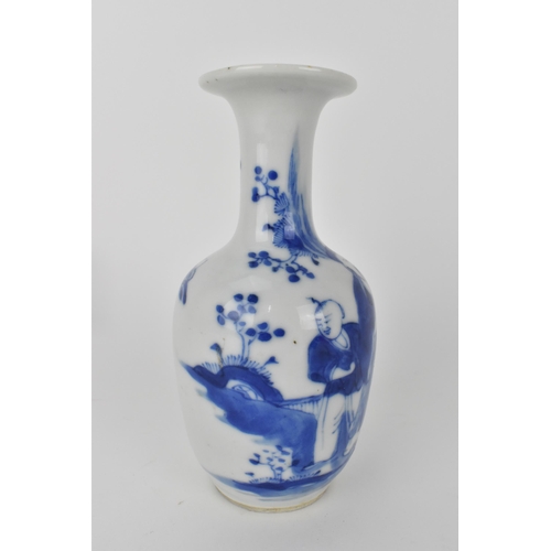 107 - A late Qing dynasty blue and white bottle vase of ovoid shape with a broad flat rim, a continuous ri... 