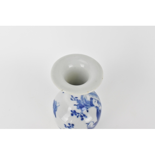 107 - A late Qing dynasty blue and white bottle vase of ovoid shape with a broad flat rim, a continuous ri... 