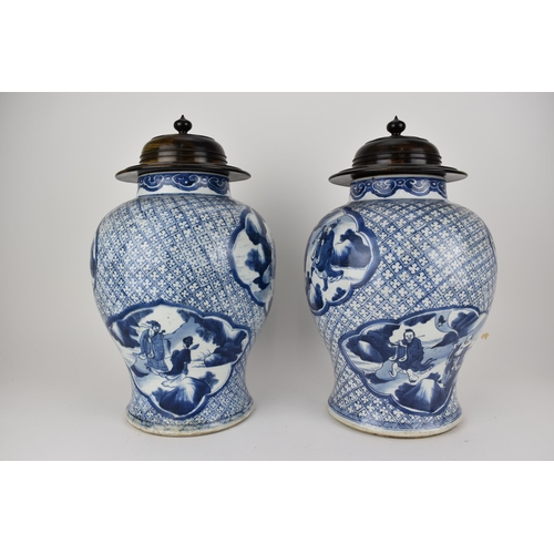 111 - A pair of Chinese Qing dynasty blue and white porcelain vases, 18th century of baluster shape with a... 