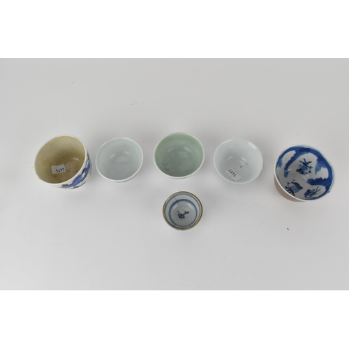 118 - Six Chinese Qing dynasty blue and white tea bowls, 19th/20th century, four decorated with flowers, o... 