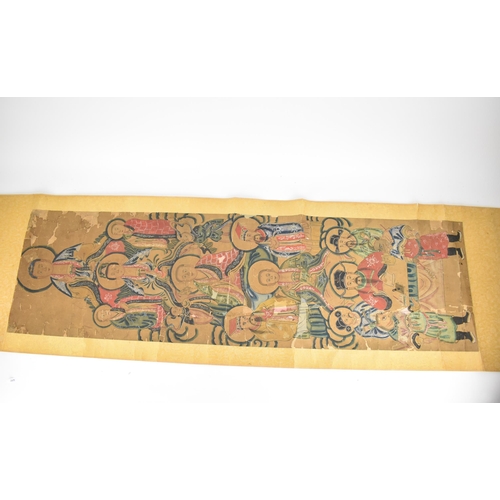 129 - A Chinese Qing Dynasty ancestral portraits, 18th/19th century, mounted as a scroll of men and women,... 