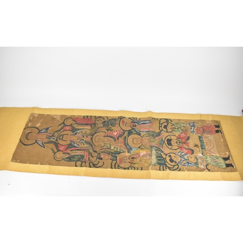 129 - A Chinese Qing Dynasty ancestral portraits, 18th/19th century, mounted as a scroll of men and women,... 