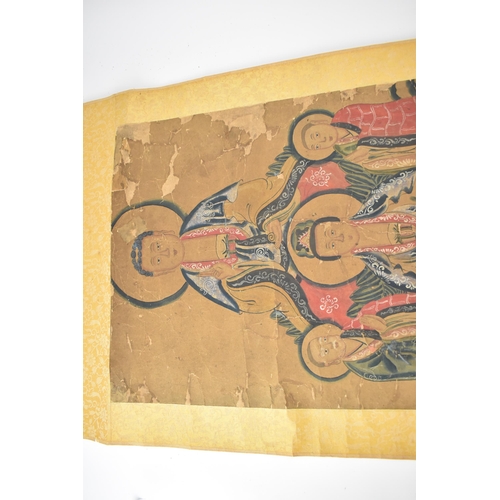 129 - A Chinese Qing Dynasty ancestral portraits, 18th/19th century, mounted as a scroll of men and women,... 