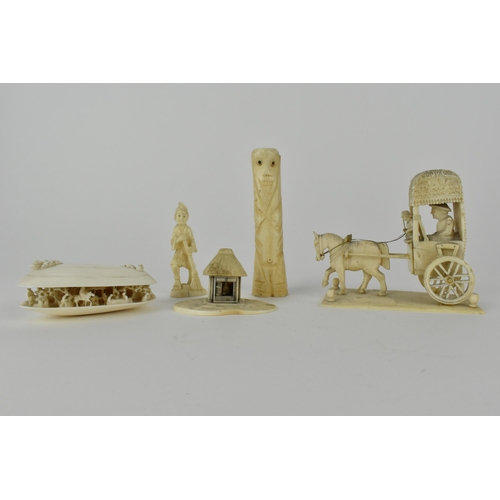 130 - Early 20th century ivory Okimonos comprising of a Japanese clam shell with figures, buildings and tr... 