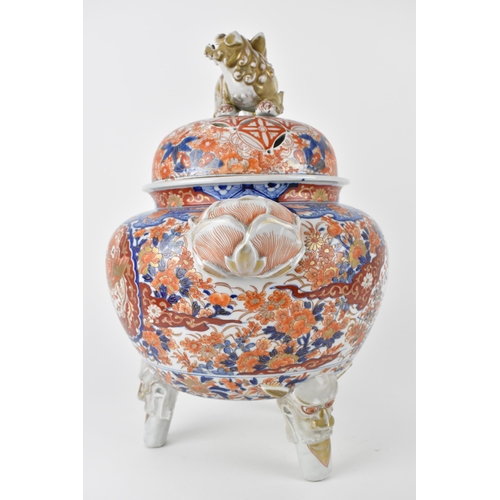 136 - A Japanese Meiji/Taisho period Imari incense burner of bulbous shape, the cover with pierced ornamen... 