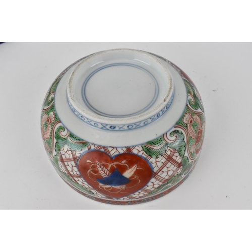 137 - Chinese Qing dynasty porcelain comprising of a 19th century Canton jug and a pair of plates, decorat... 