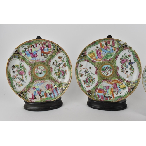 137 - Chinese Qing dynasty porcelain comprising of a 19th century Canton jug and a pair of plates, decorat... 